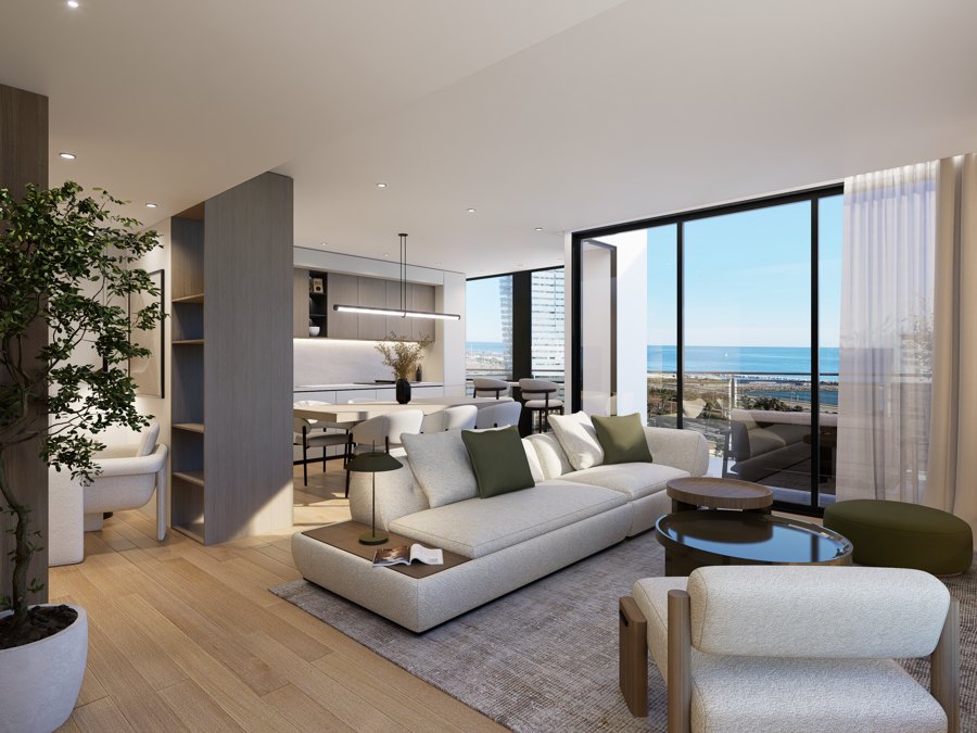 Salón y cocina abiertos con vistas al mar diseñados por Arkitektismo